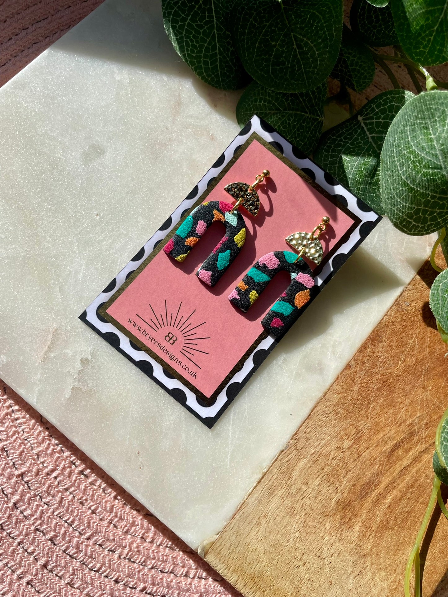 Black Tutti Fruitti Arch Dangle Statement Earrings